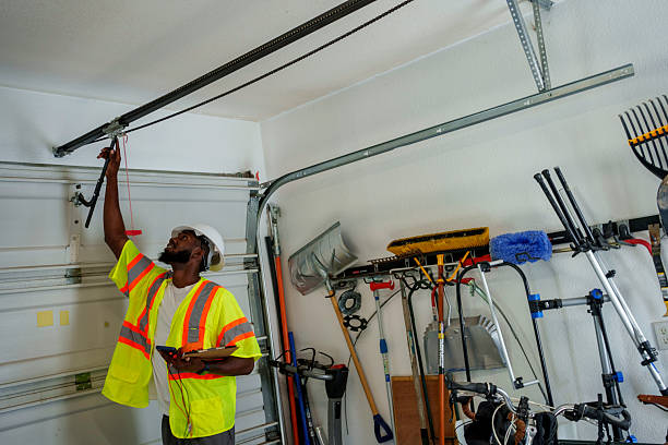 Professional Garage Door Installation technician working in Lake LeAnn, MI